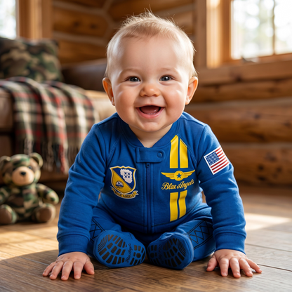 Joyful baby in Blue Angels flight suit with American flag and patches, perfect for little aviators.