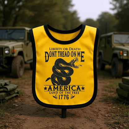 Dont Tread on Me Baby Bib with snake graphic on yellow fabric, designed for infants, emphasizing patriotic themes.