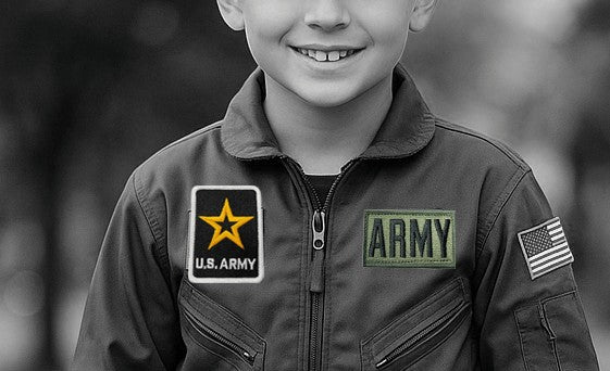 Boy in army flight suit with U.S. Army patches, showcasing licensed Patch suitability for youth clothing.