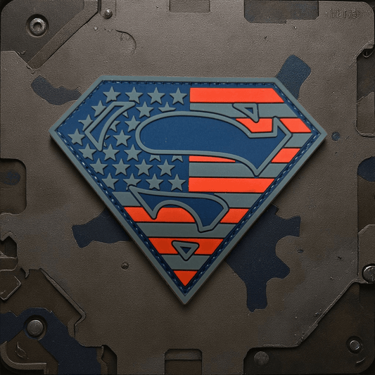 Superman Stars and Stripes Large PVC Patch on a textured background, ideal for kids' uniforms and accessories.