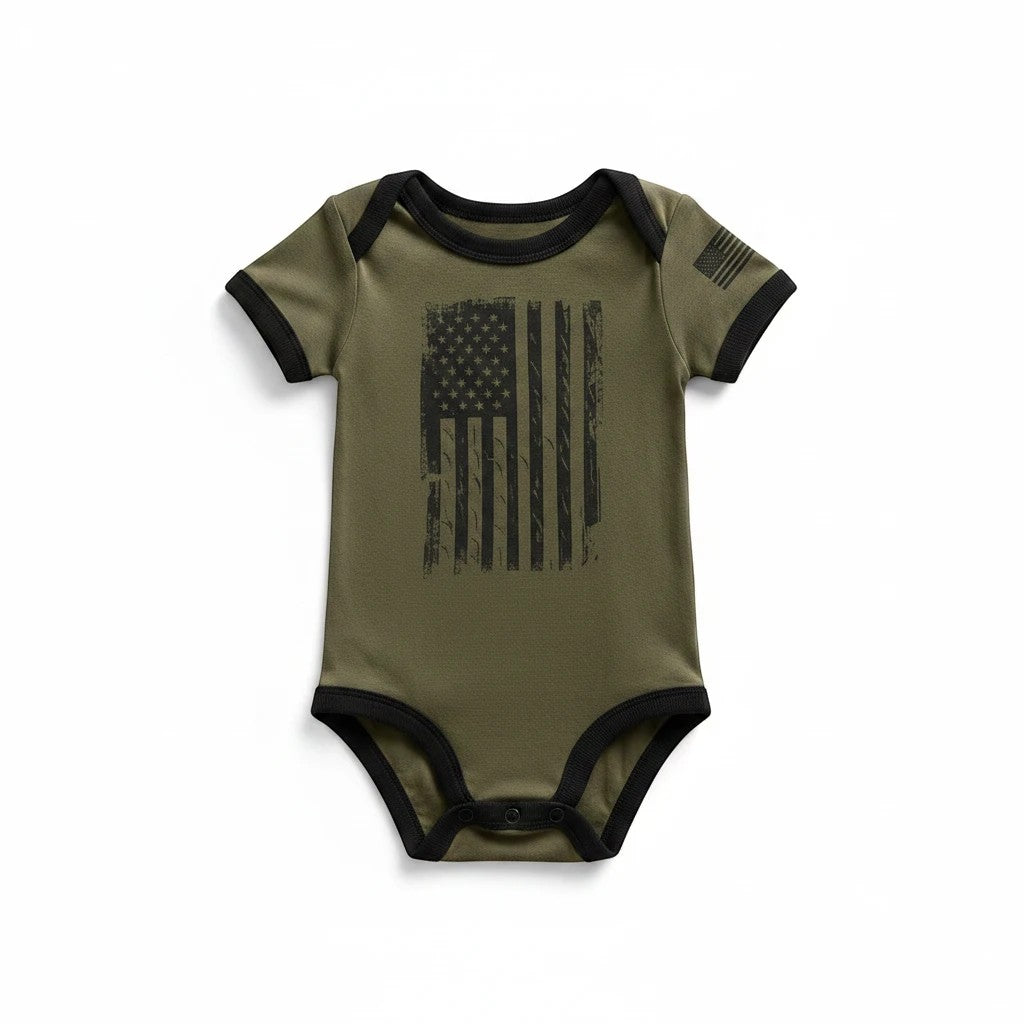 Trooper Clothing OD green baby bodysuit with distressed American flag print and black trim details.