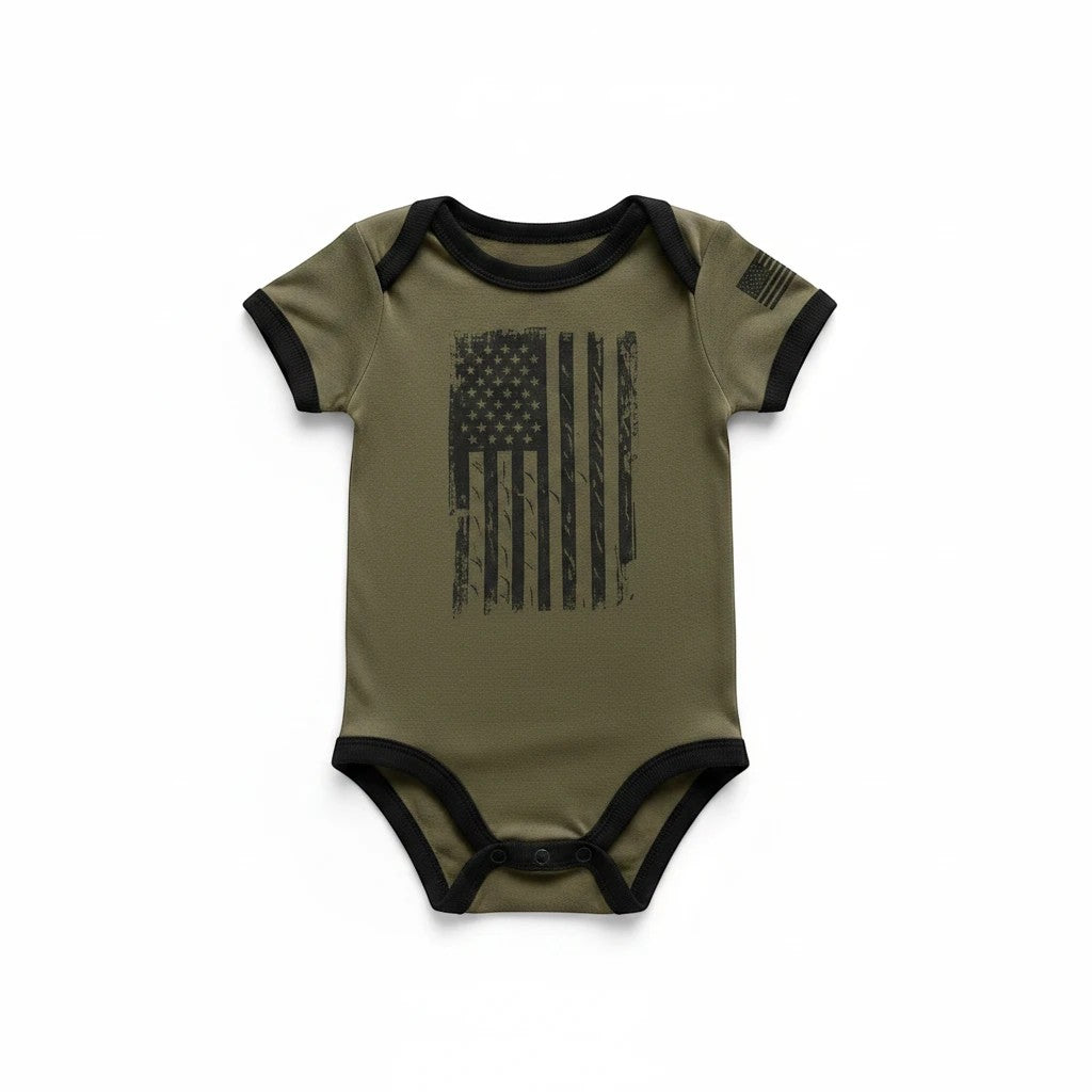Trooper Clothing OD green baby bodysuit with a distressed American flag print and black trim details.