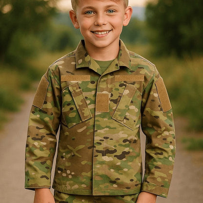 Trooper Clothing youth multicam uniform top in durable ripstop fabric with chest pockets and hook-and-loop patches.