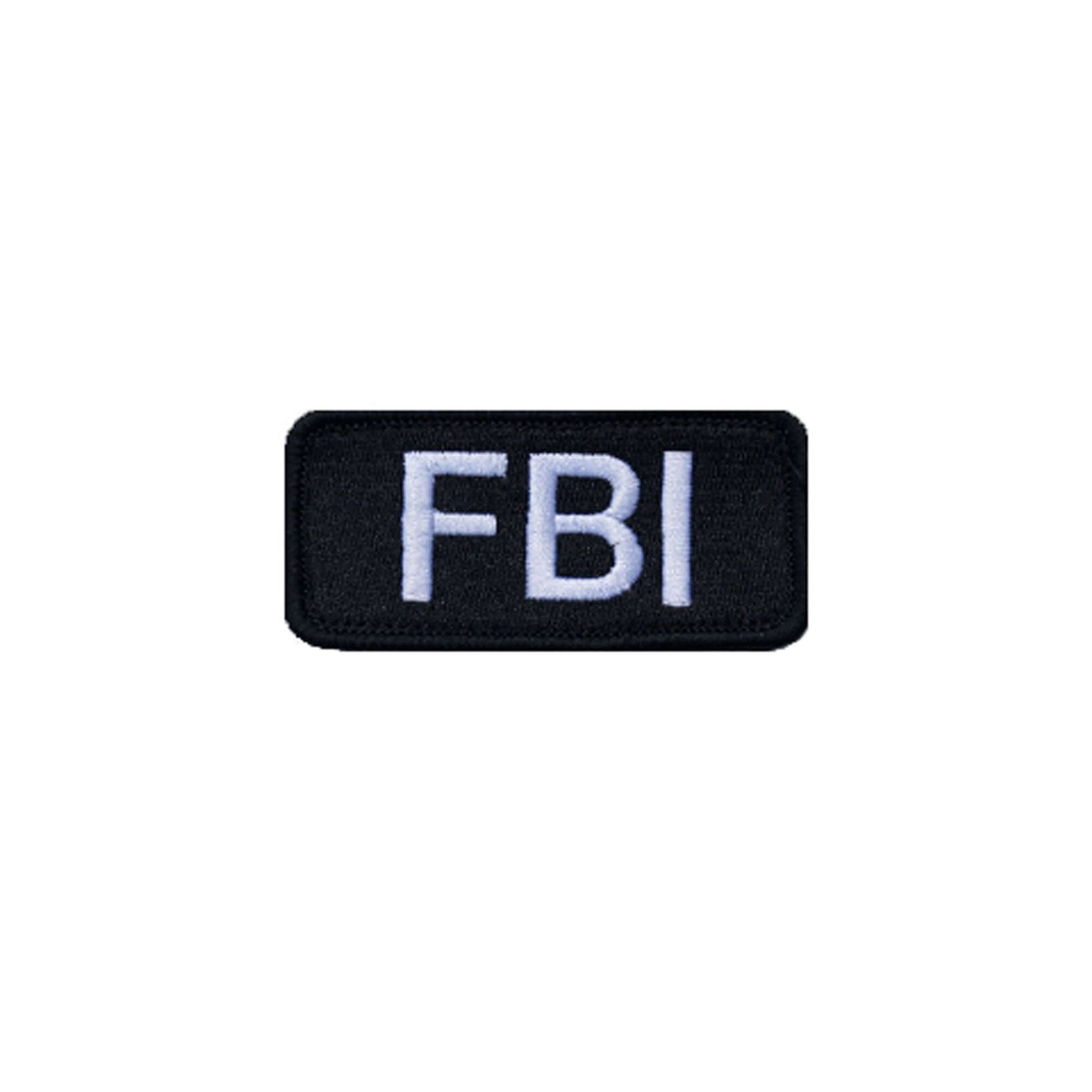 Black FBI patch with white lettering, perfect for tactical uniforms and youth costume accessories.