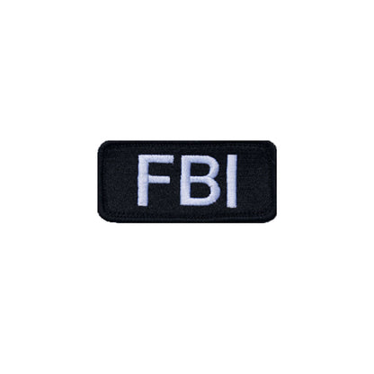 Black FBI patch with white lettering, perfect for tactical uniforms and youth costume accessories.