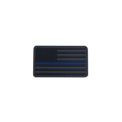 Blue Line United States flag PVC morale patch on a background, symbolizing patriotism and support for law enforcement.